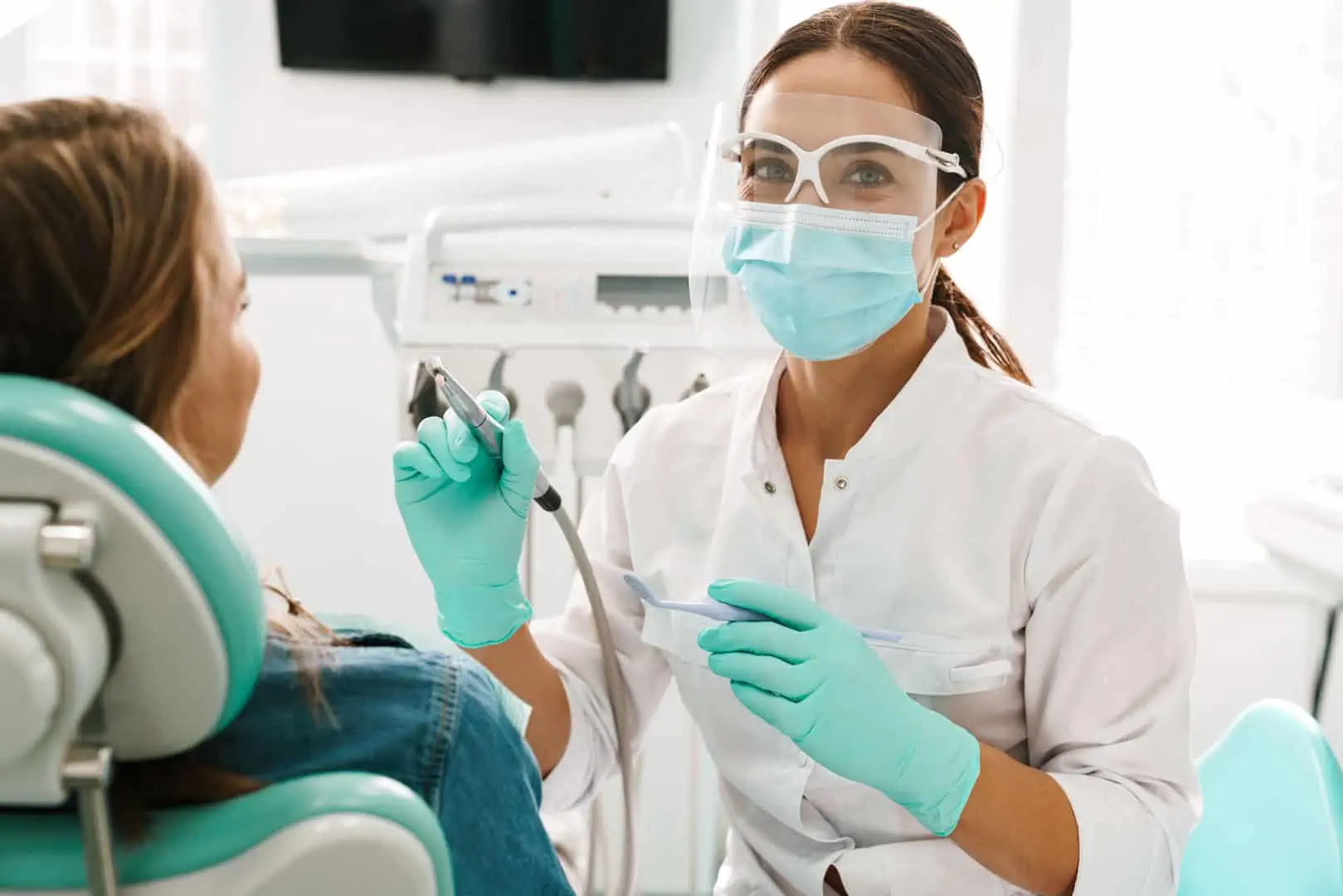 Patient smiling after a dental cleaning